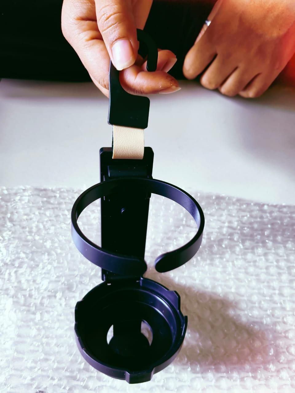 Car Multifunctional Hook – 3-in-1 Organizer (Water Bottle Holder + Phone Stand + Bag Hook)